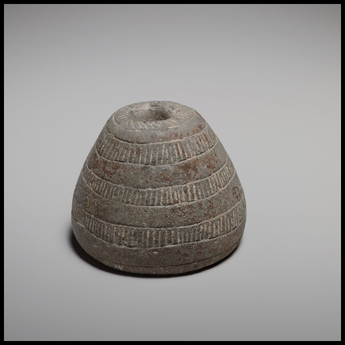 Conical spindle-whorl with flat base, Terracotta, Cypriot 