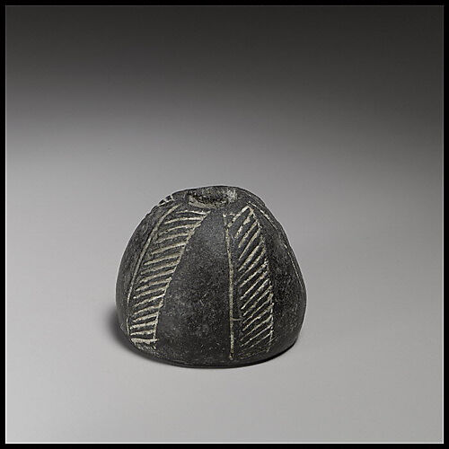 Terracotta conical-hemispherical spindle-whorl with flat base and rounded top