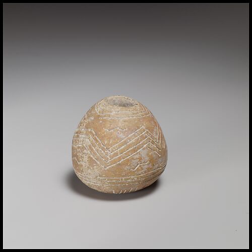 Terracotta conical-hemispherical spindle-whorl with rounded base