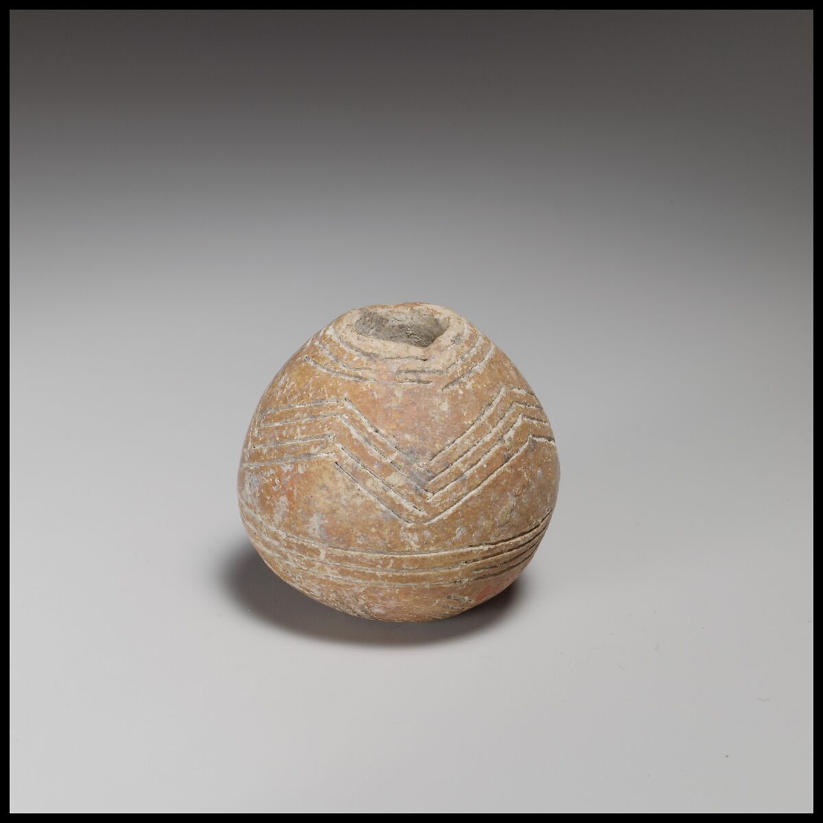 Spherical spindle-whorl, Terracotta, Cypriot 
