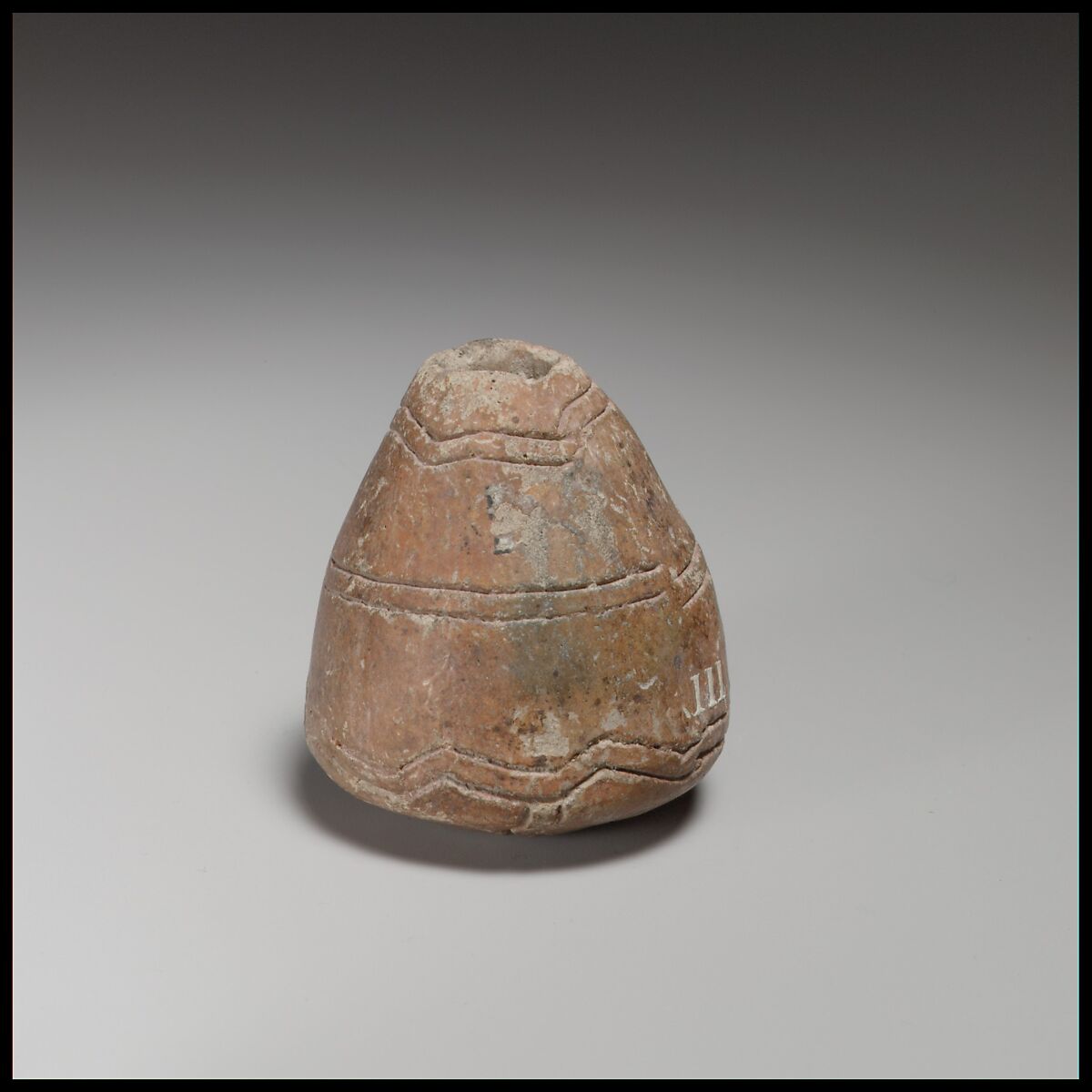 Conical-hemispherical spindle-whorl with slightly rounded base, Terracotta, Cypriot 