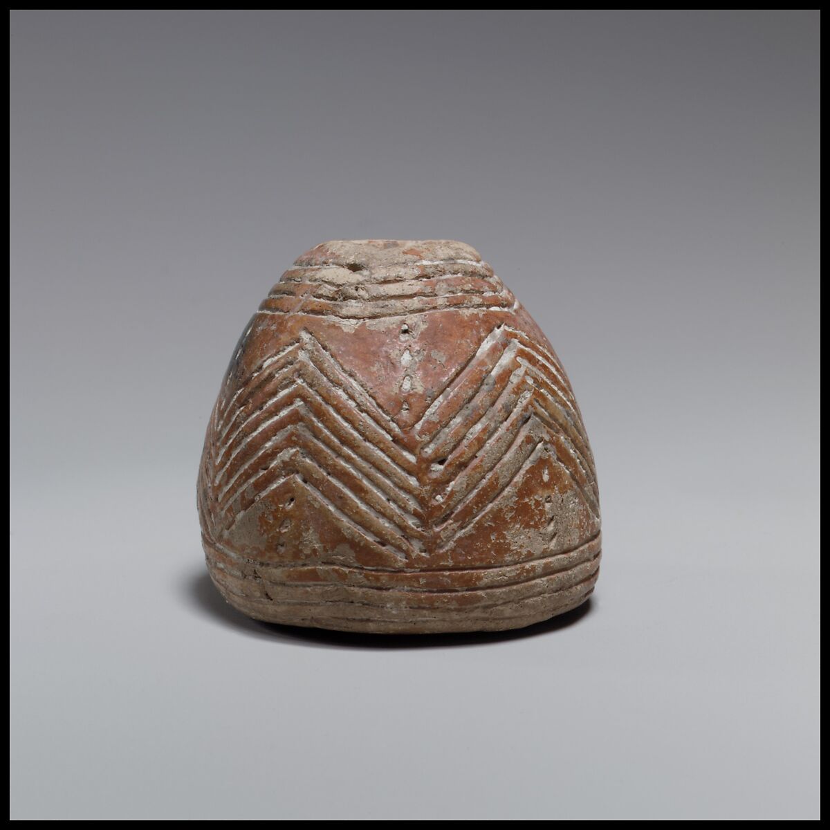 Terracotta conical-hemispherical spindle-whorl with flat base, Terracotta, Cypriot 