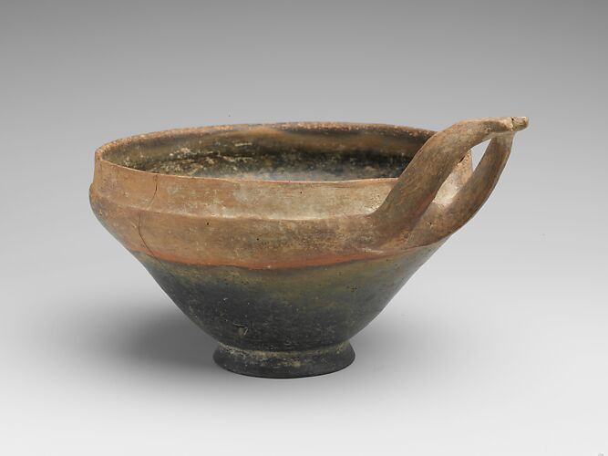 Terracotta bowl with wishbone handle