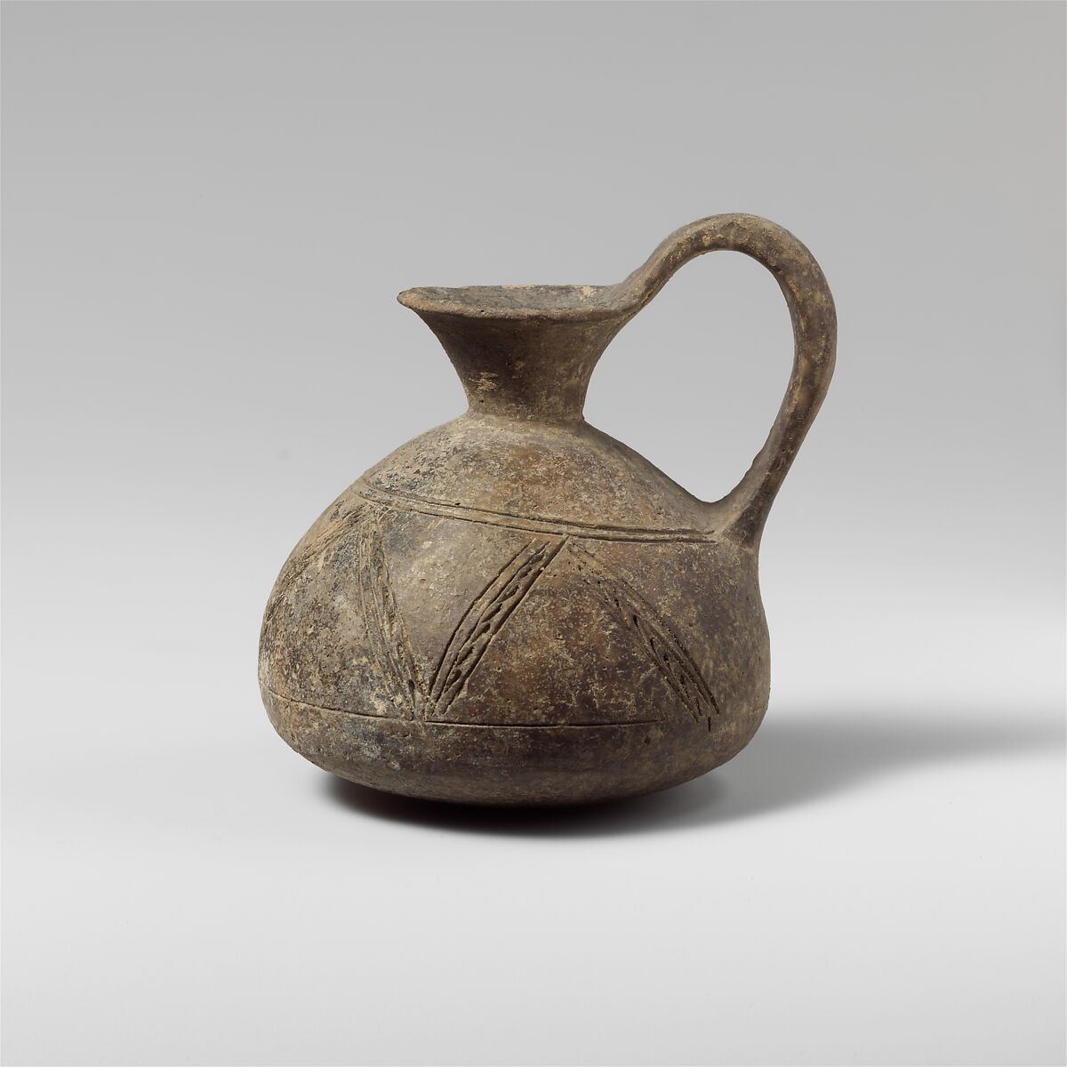 Terracotta jug with incised decoration, Terracotta, Cypriot