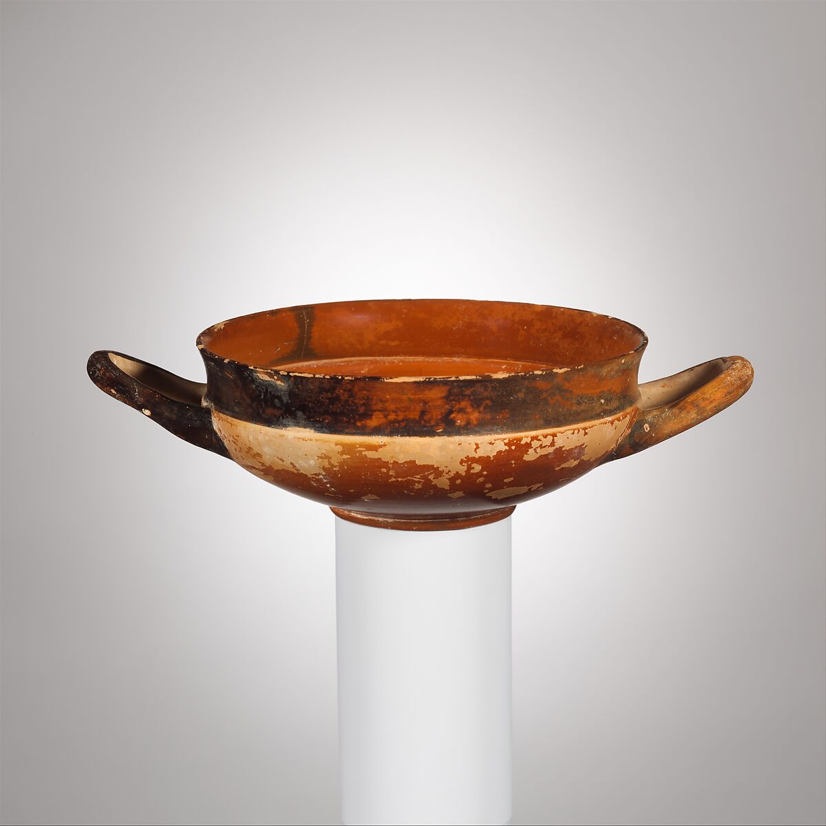 Terracotta stemless kylix (drinking cup), Terracotta, Greek, Attic 