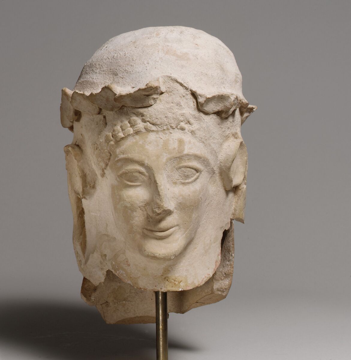 Terracotta head with wreath, Terracotta, Cypriot 