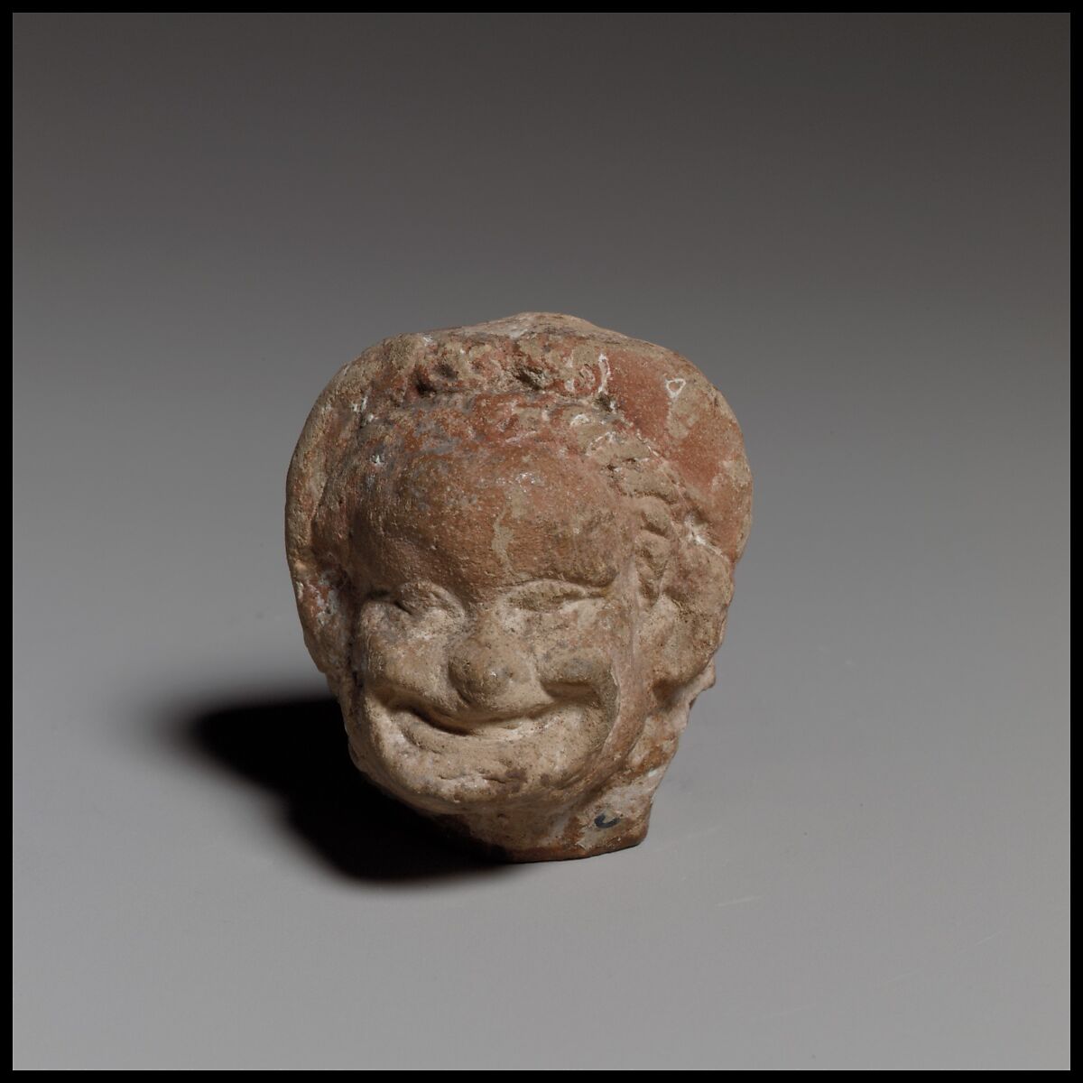 Head of a comic figurine, Terracotta, Greek, Attic ? 
