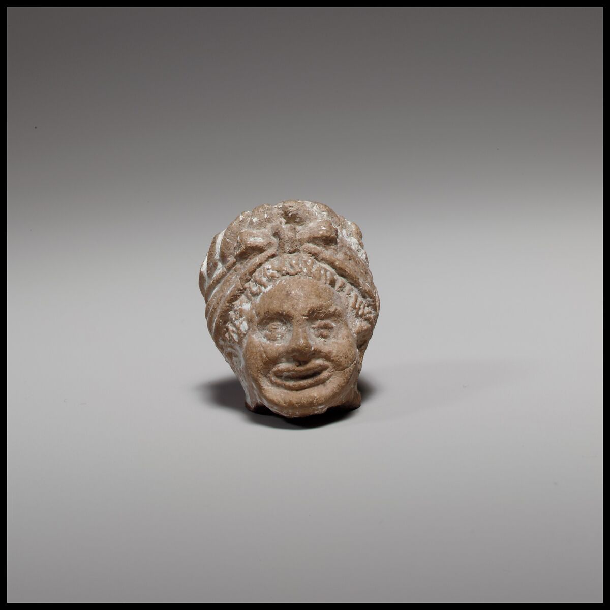 Head of a comic figurine, Terracotta, Cypriot 