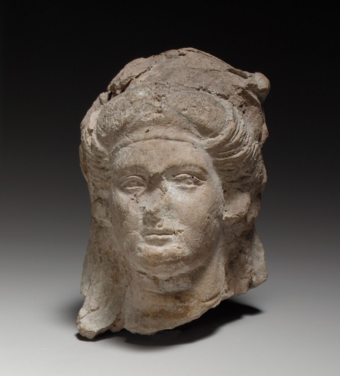 Female head, probably of a goddess, Terracotta, Cypriot 