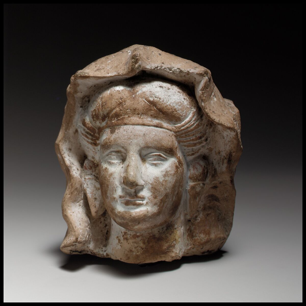 Female head, probably of a goddess, Terracotta, Cypriot 