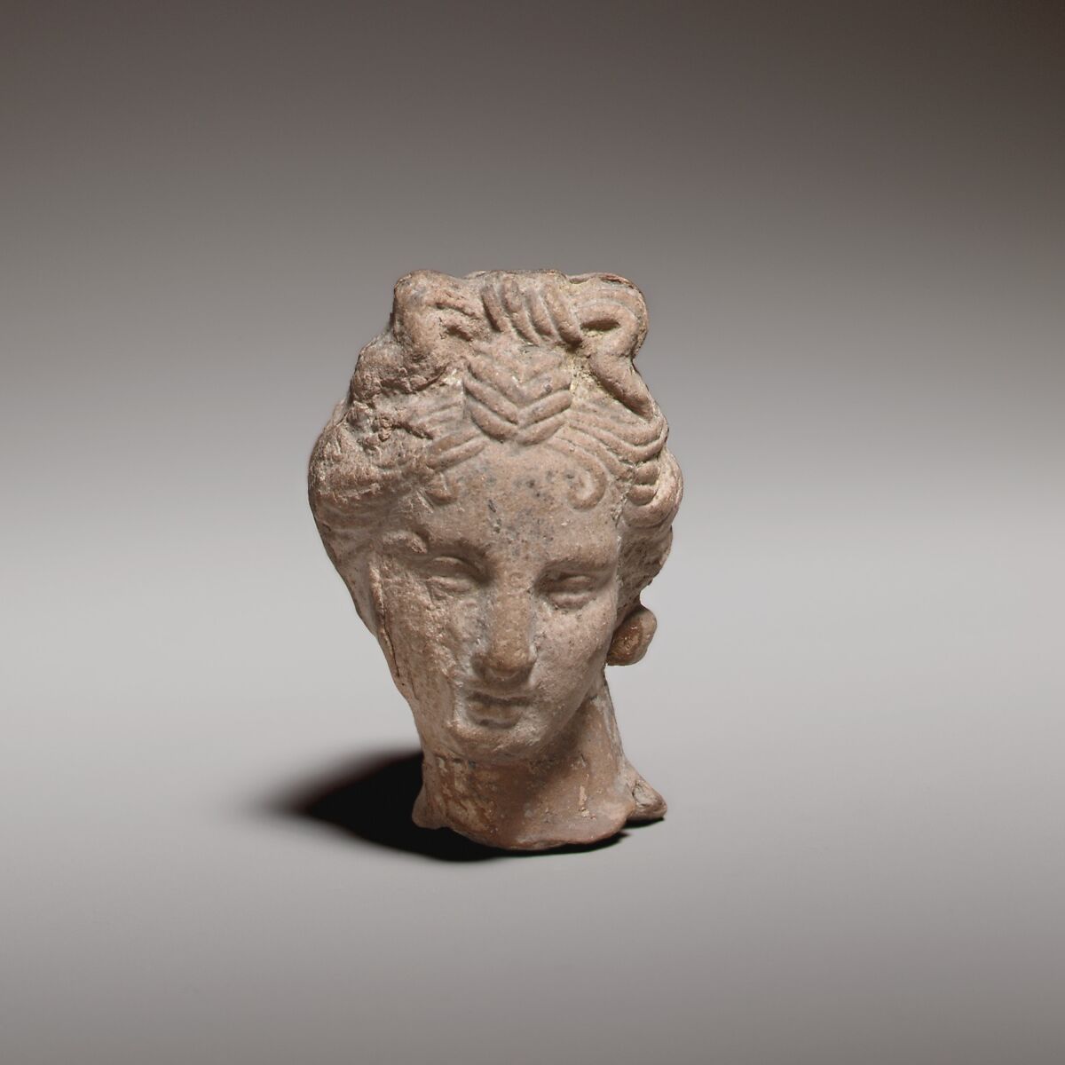 Terracotta female head, Terracotta, Greek, Asia Minor, Smyrna ?