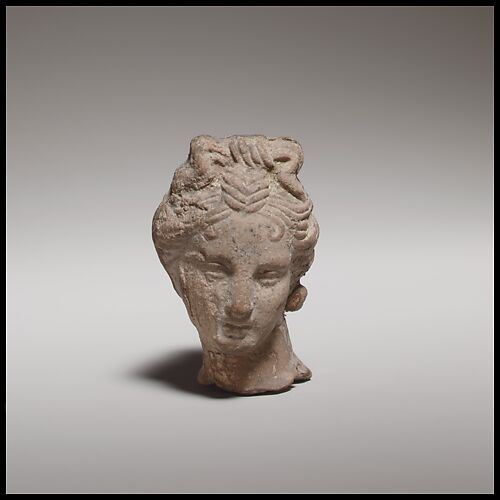 Terracotta female head