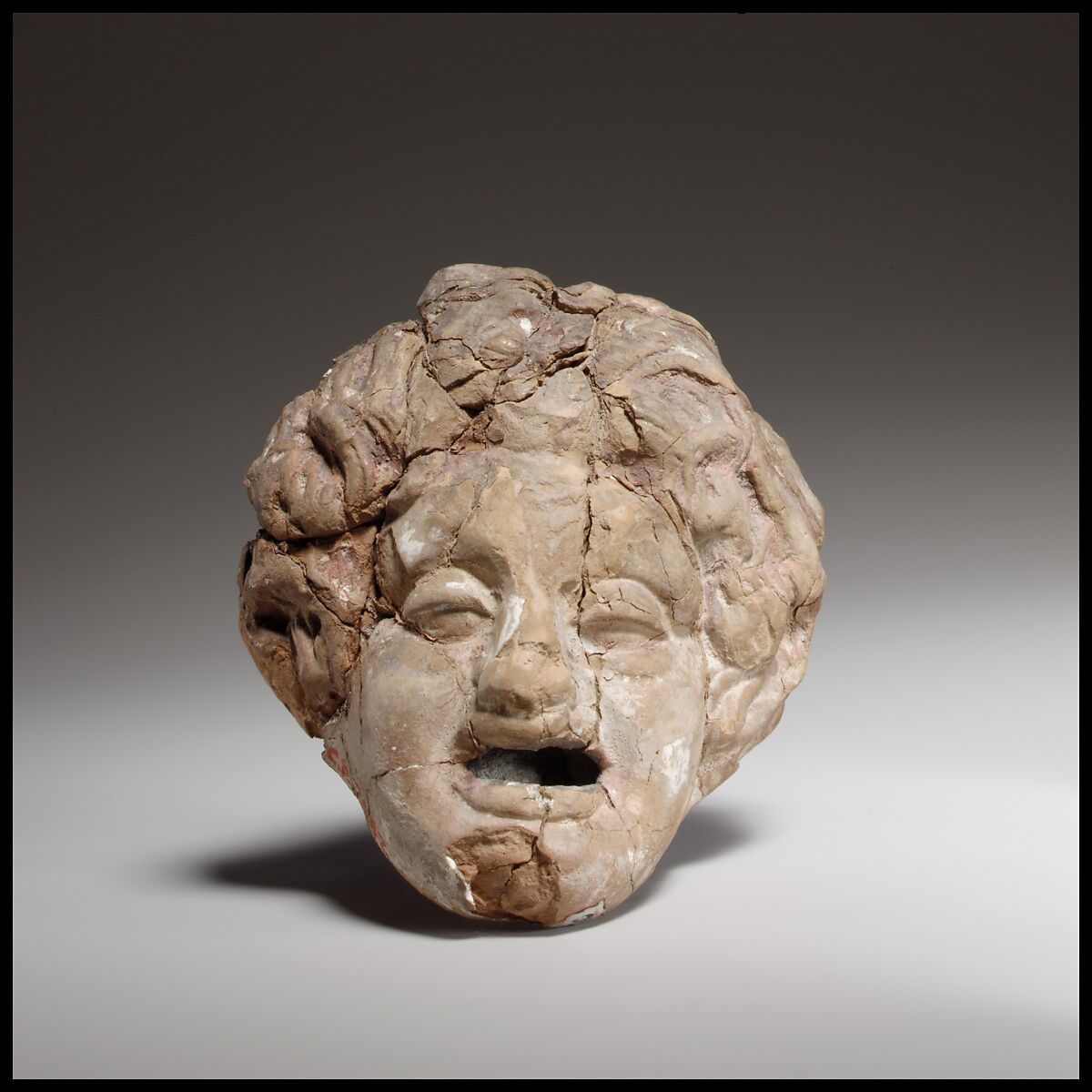 Comic mask, Terracotta, Greek, possibly Attic