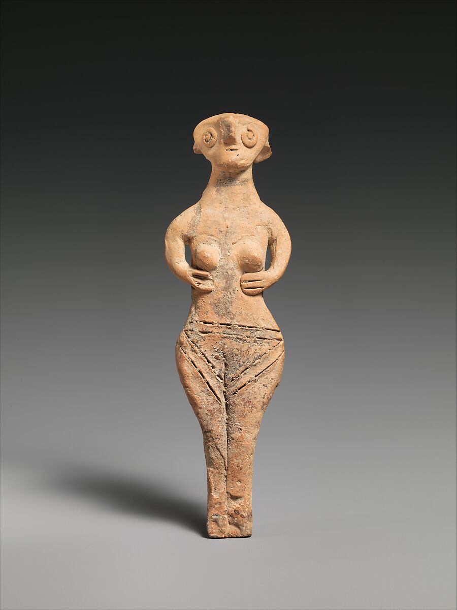 Naked woman in terracotta represented with a rounded bel…