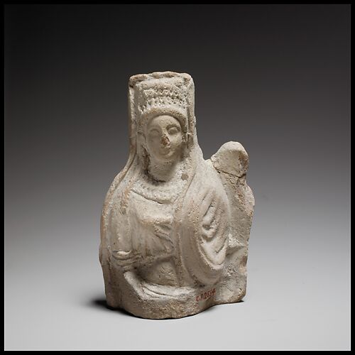Terracotta statuette of a seated goddess