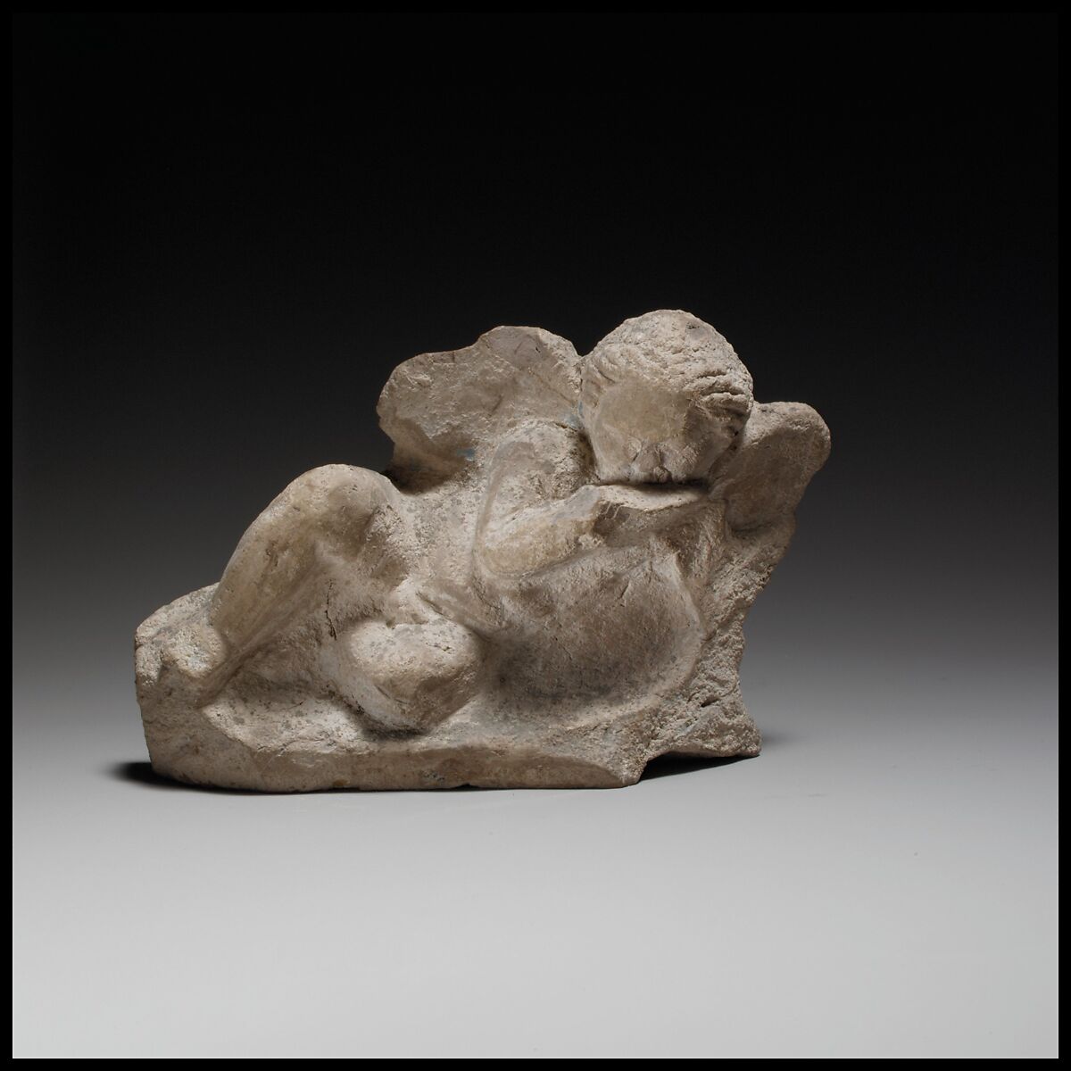 Terracotta statuette of Eros banqueting, Terracotta, Cypriot