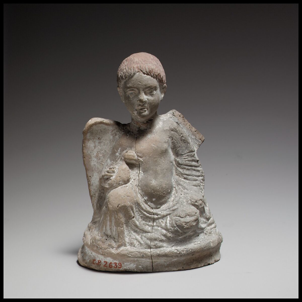 Terracotta statuette of Eros seated and holding a duck, Terracotta, Cypriot 