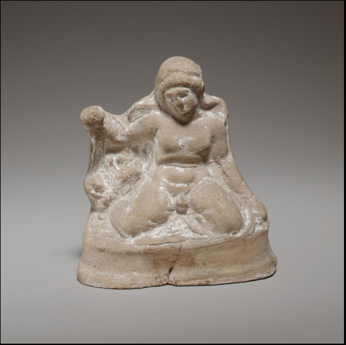 Seated boy, Terracotta, Cypriot