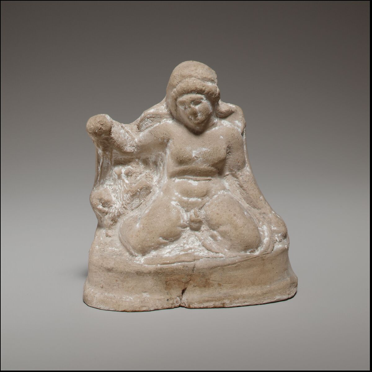 Seated boy, Terracotta, Cypriot