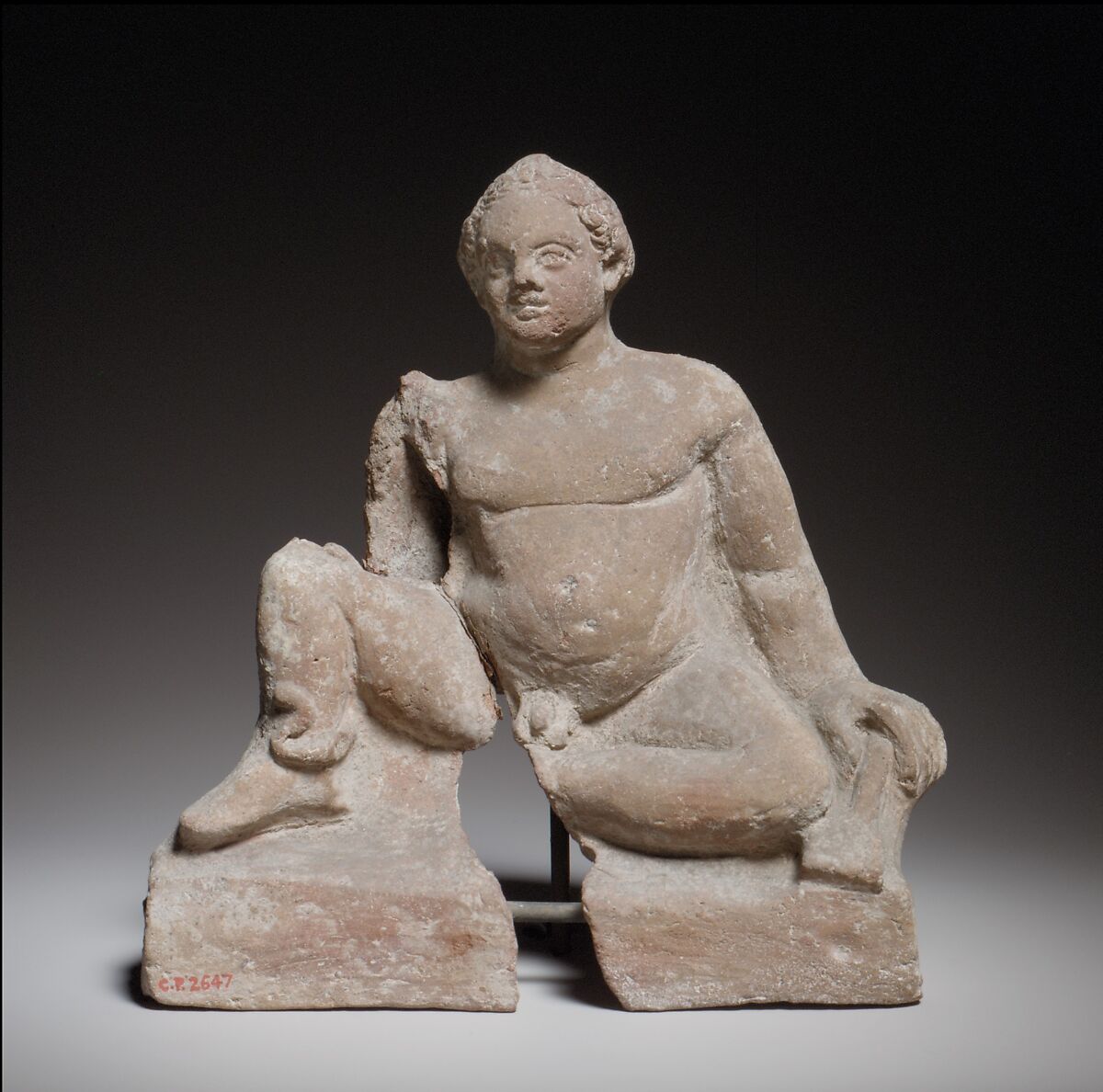 Seated boy, Terracotta, Cypriot