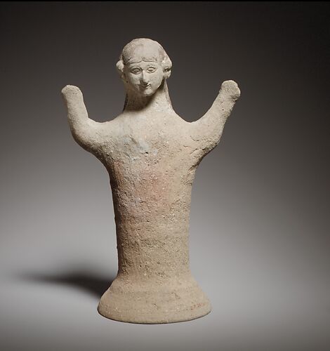 Terracotta statuette of a woman with raised arms