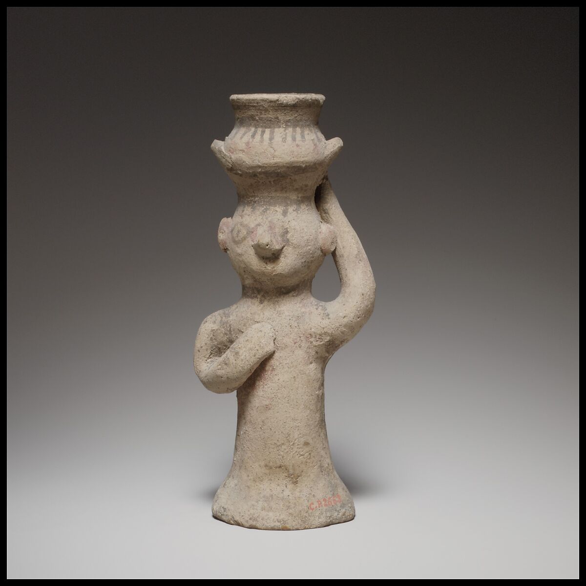 Standing female figurine holding an amphora on her head, Terracotta, Cypriot 