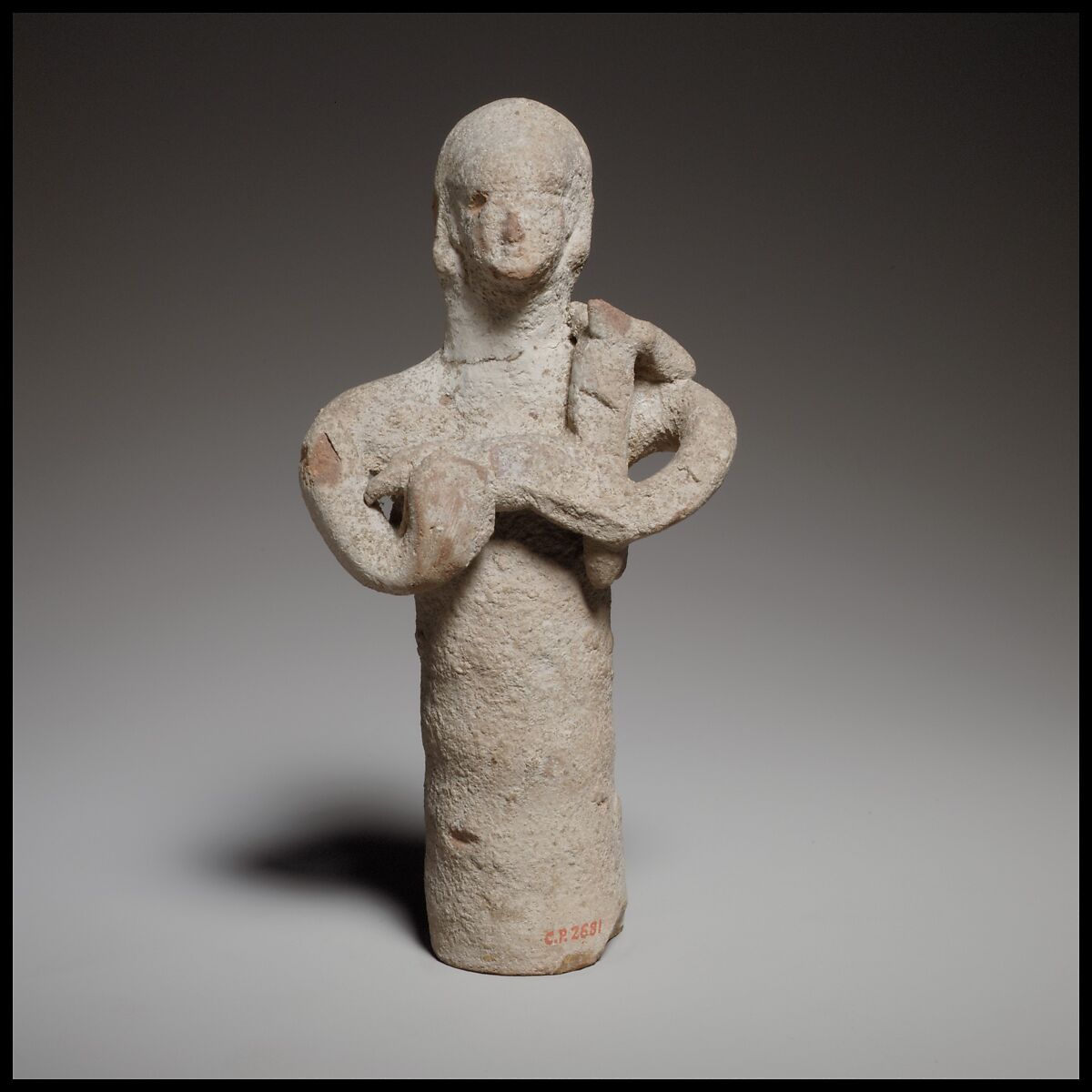 Standing figurine holding a quadruped, Terracotta, Cypriot 