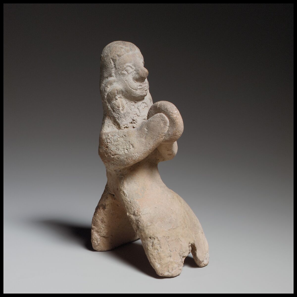 Seated female tambourine player, Terracotta, Cypriot 
