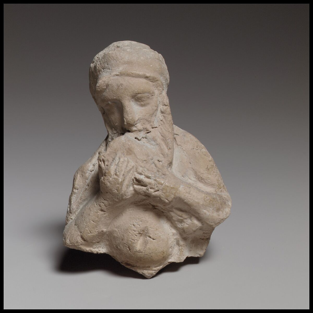 Terracotta statuette of Silenos (?) drinking, Terracotta, Cypriot 
