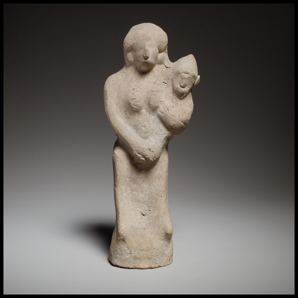 Seated female figurine holding a baby, Terracotta, Cypriot 