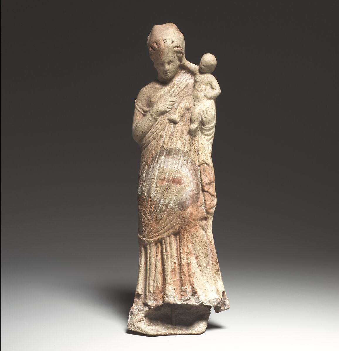 Terracotta statuette of a woman holding a baby, Terracotta, Greek, Asia Minor, Myrina (?) 
