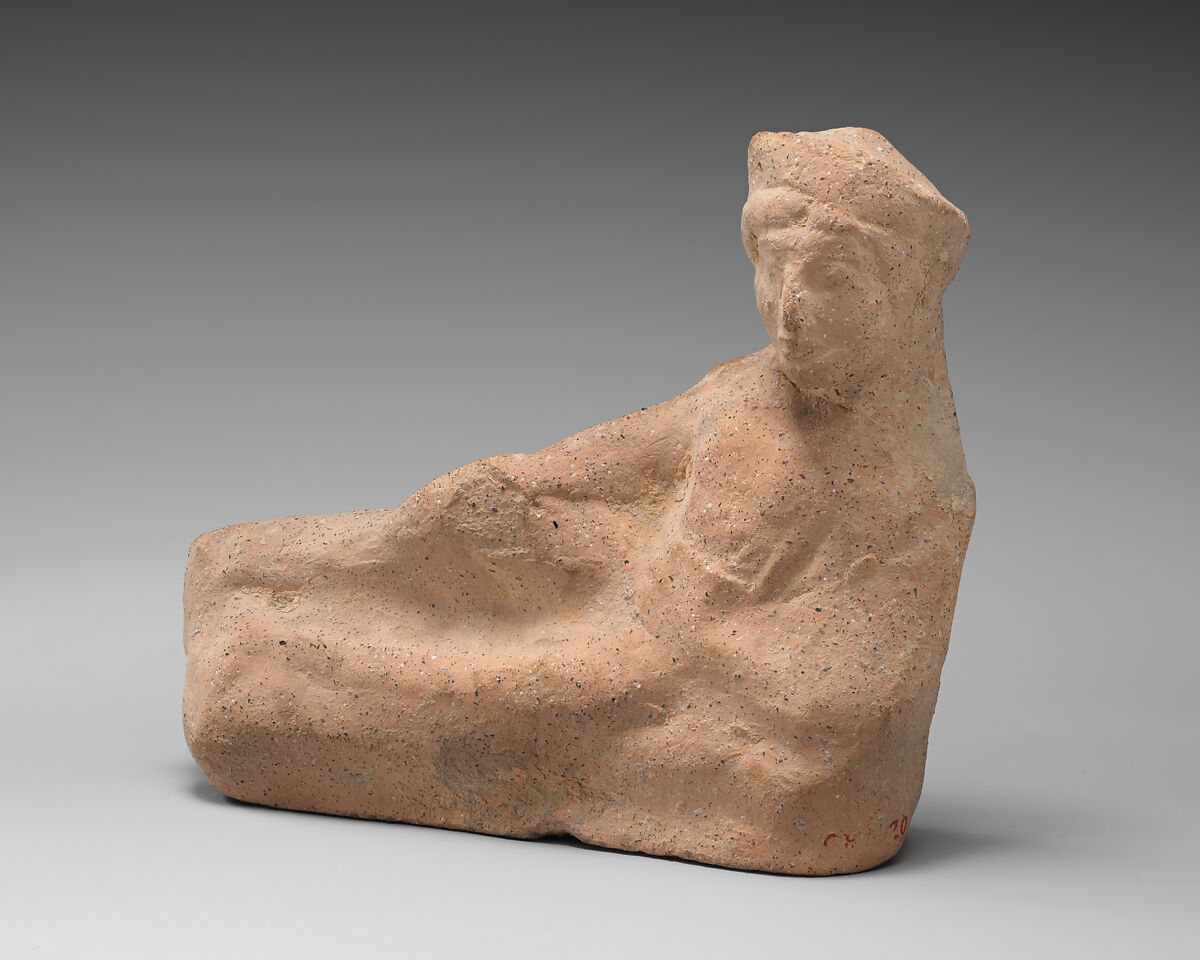 Terracotta statuette of a reclining youth, Terracotta, Cypriot