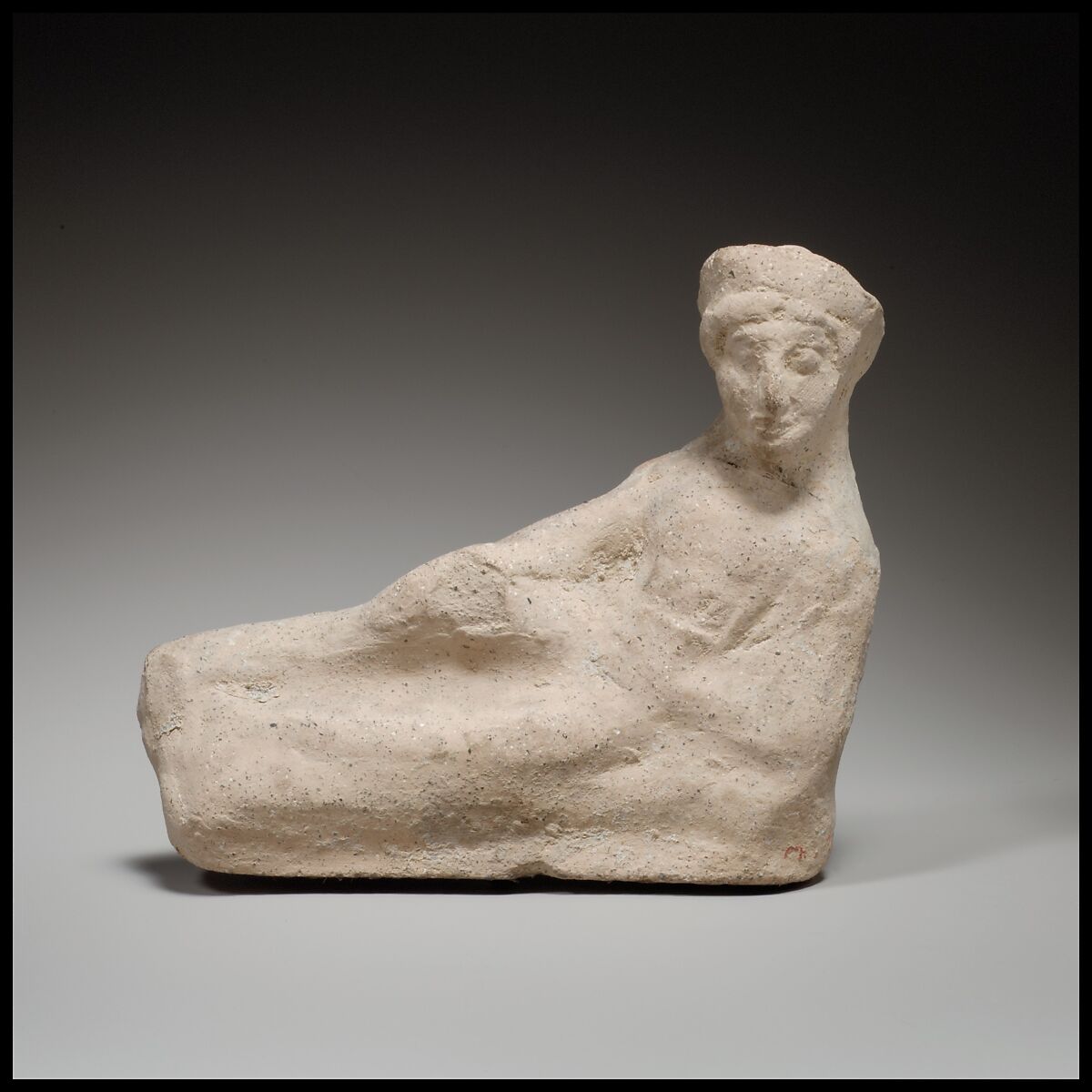 Terracotta statuette of a reclining youth, Terracotta, Cypriot 