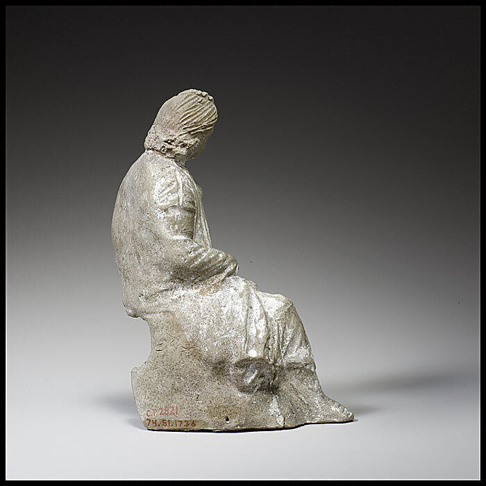 Terracotta statuette of a seated youth, Terracotta, Greek, Cypriot
