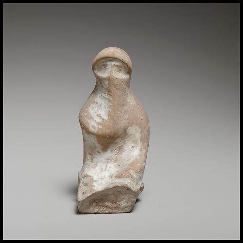 Terracotta seated veiled woman