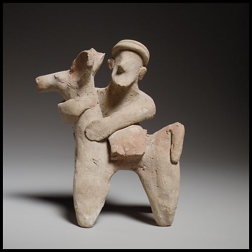 Terracotta statuette of a donkey and rider