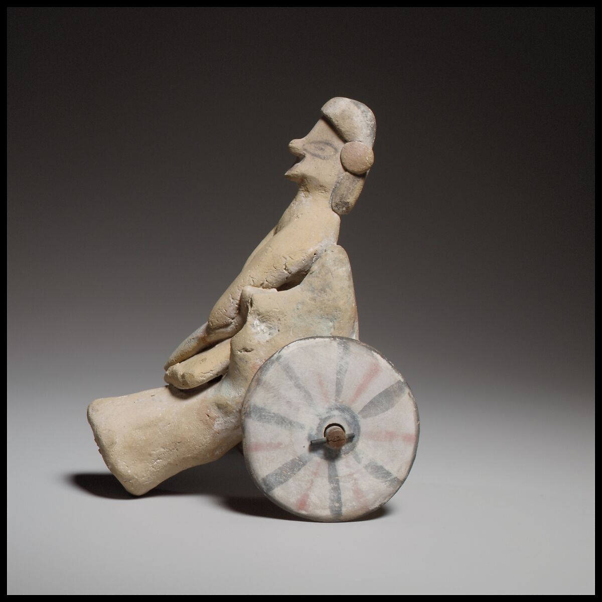 Model of a cart with a human figure, Terracotta, Cypriot 