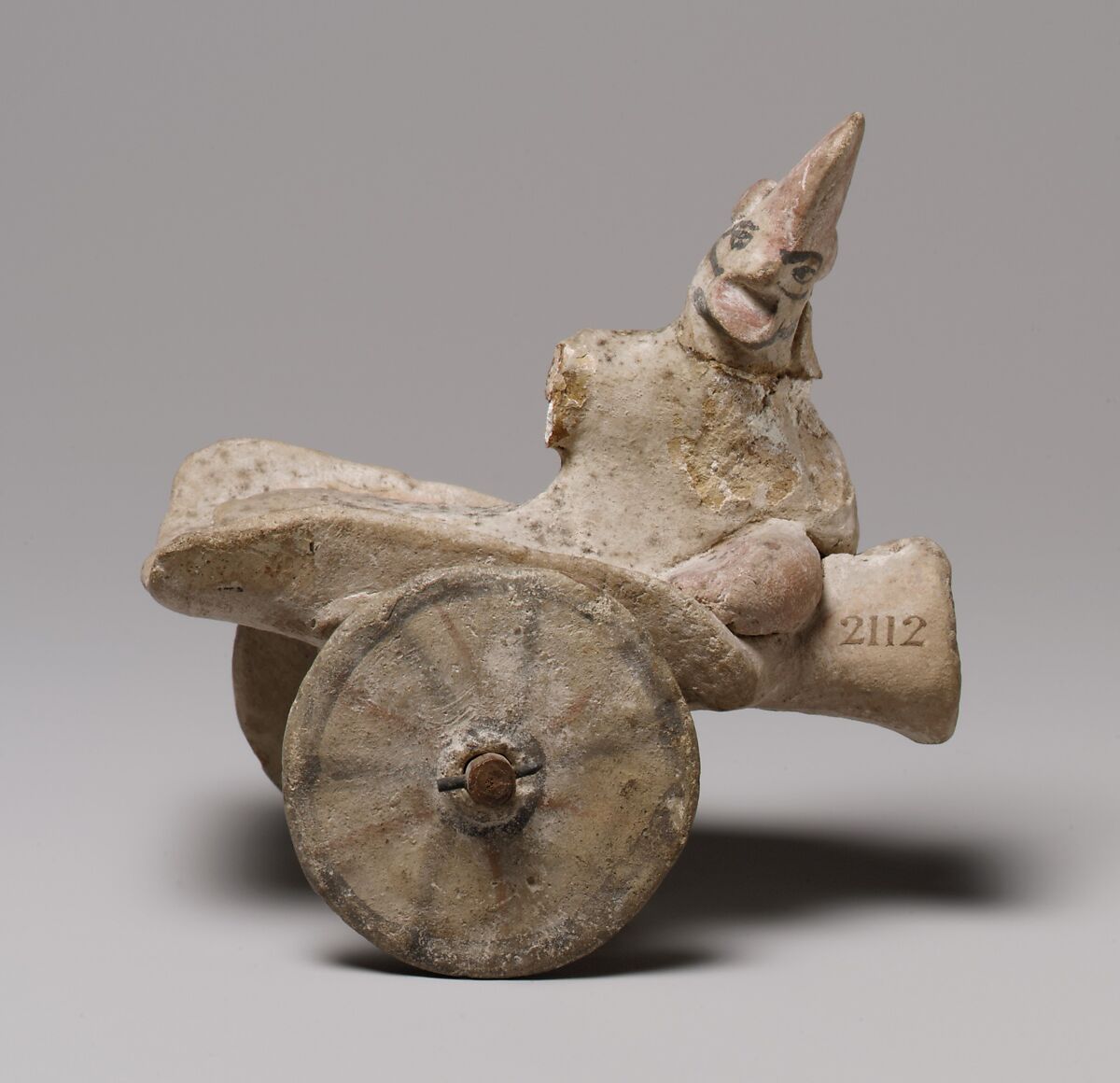 Model of a cart with a human figure, Terracotta, Cypriot 