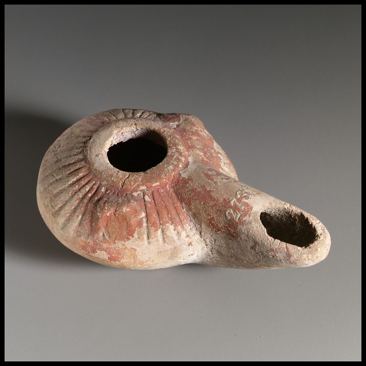 Terracotta oil lamp | Greek | Hellenistic | The Metropolitan Museum of Art