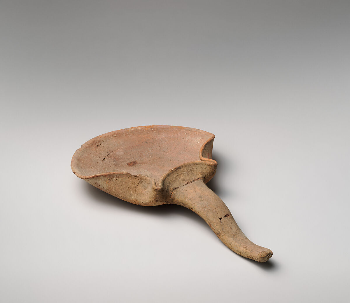 Terracotta handled saucer-shaped oil lamp, Terracotta, Cypriot