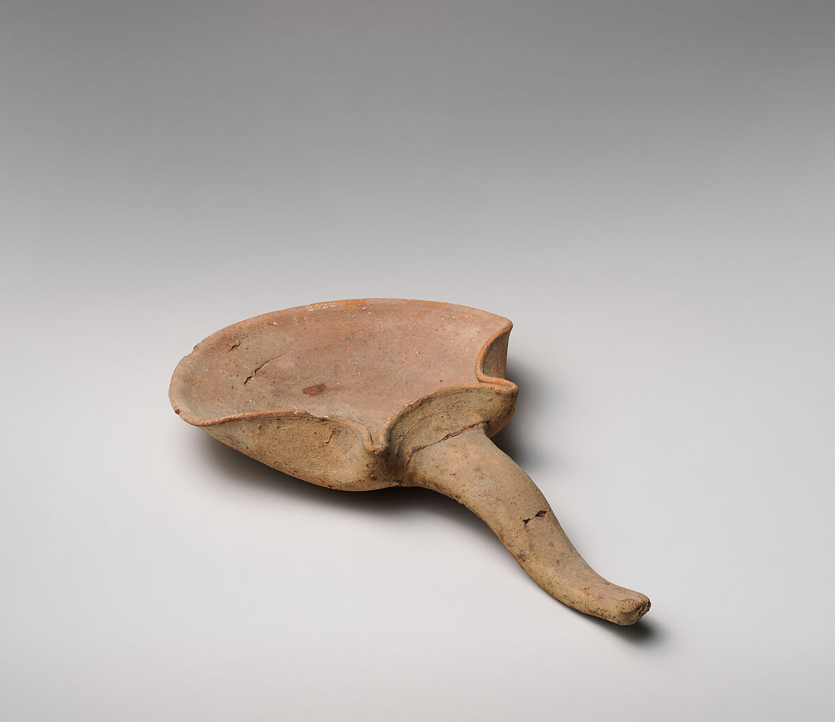 Terracotta handled saucer-shaped oil lamp, Terracotta, Cypriot 