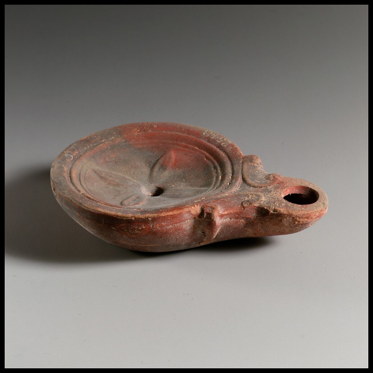 Terracotta oil lamp, Terracotta, Roman