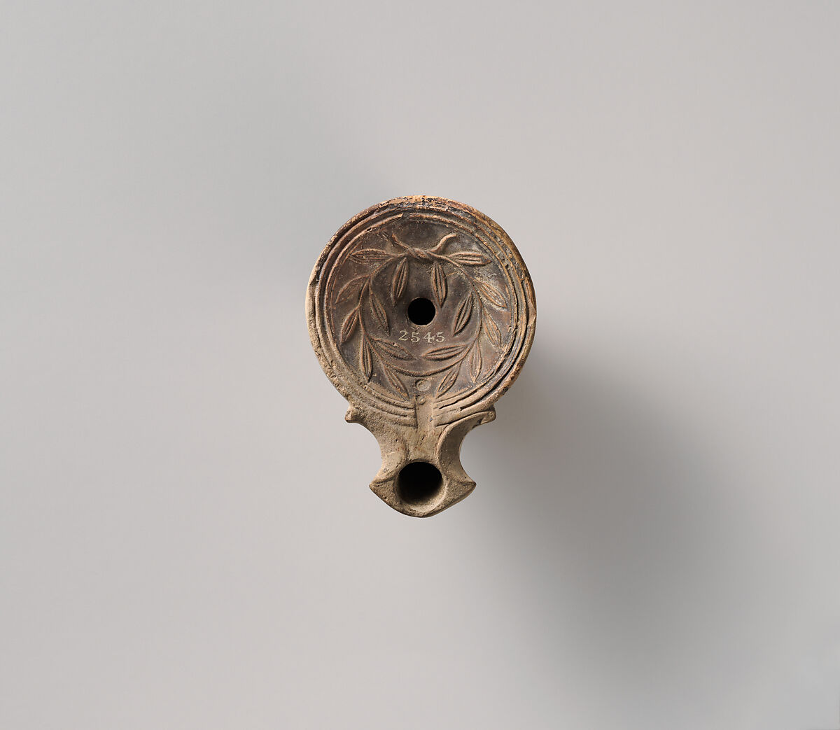 Terracotta oil lamp, Terracotta, Roman 