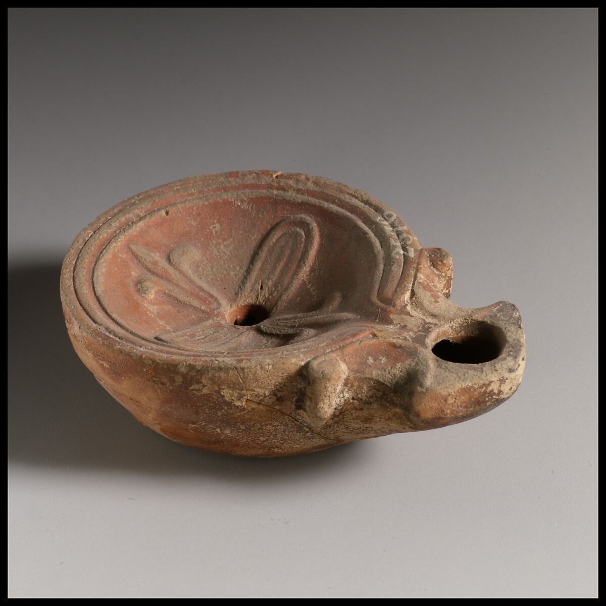 Terracotta oil lamp, Terracotta, Roman