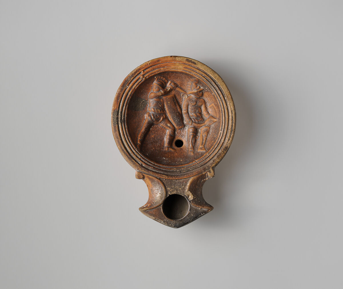 Terracotta oil lamp