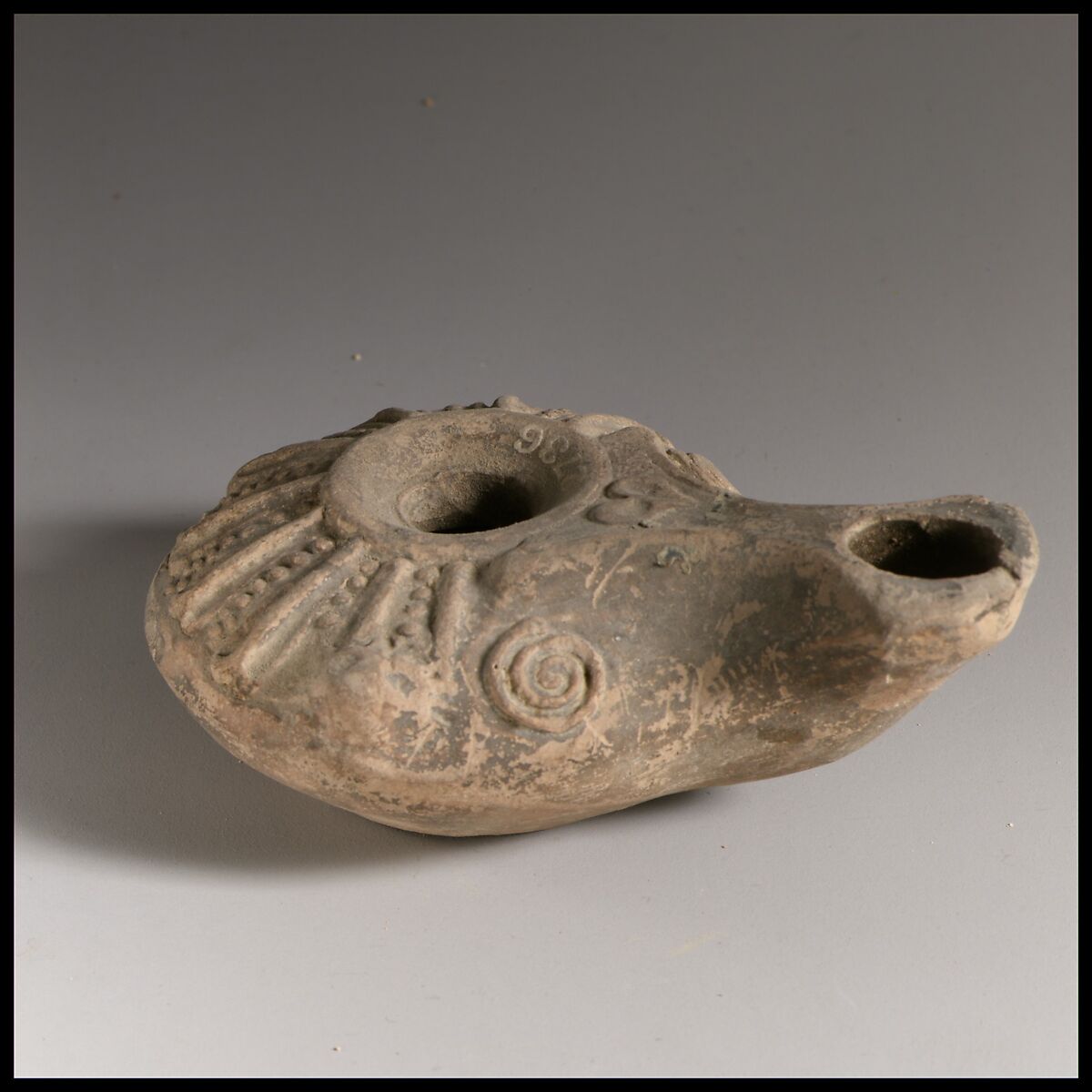 Terracotta oil lamp, Terracotta, Greek or Roman