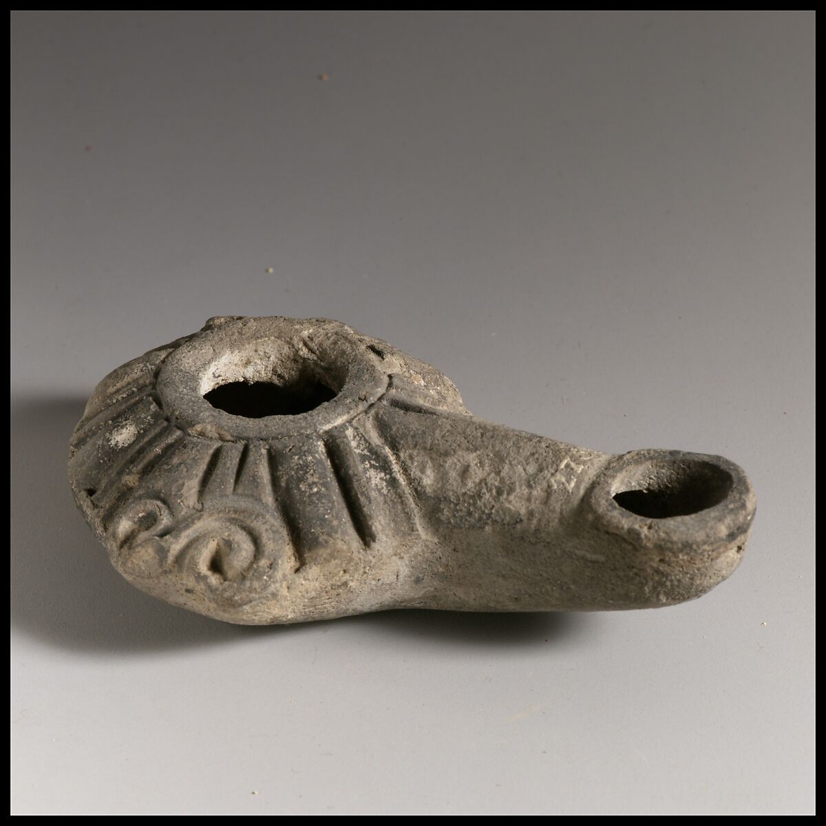 Terracotta oil lamp, Terracotta, Greek or Roman