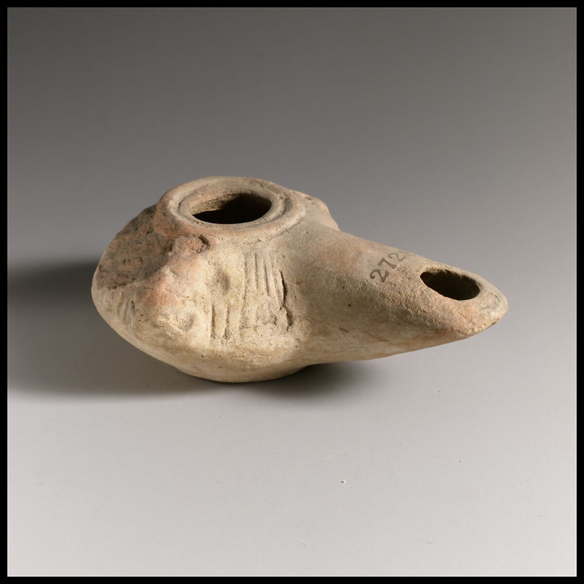 Terracotta oil lamp, Terracotta, Greek or Roman