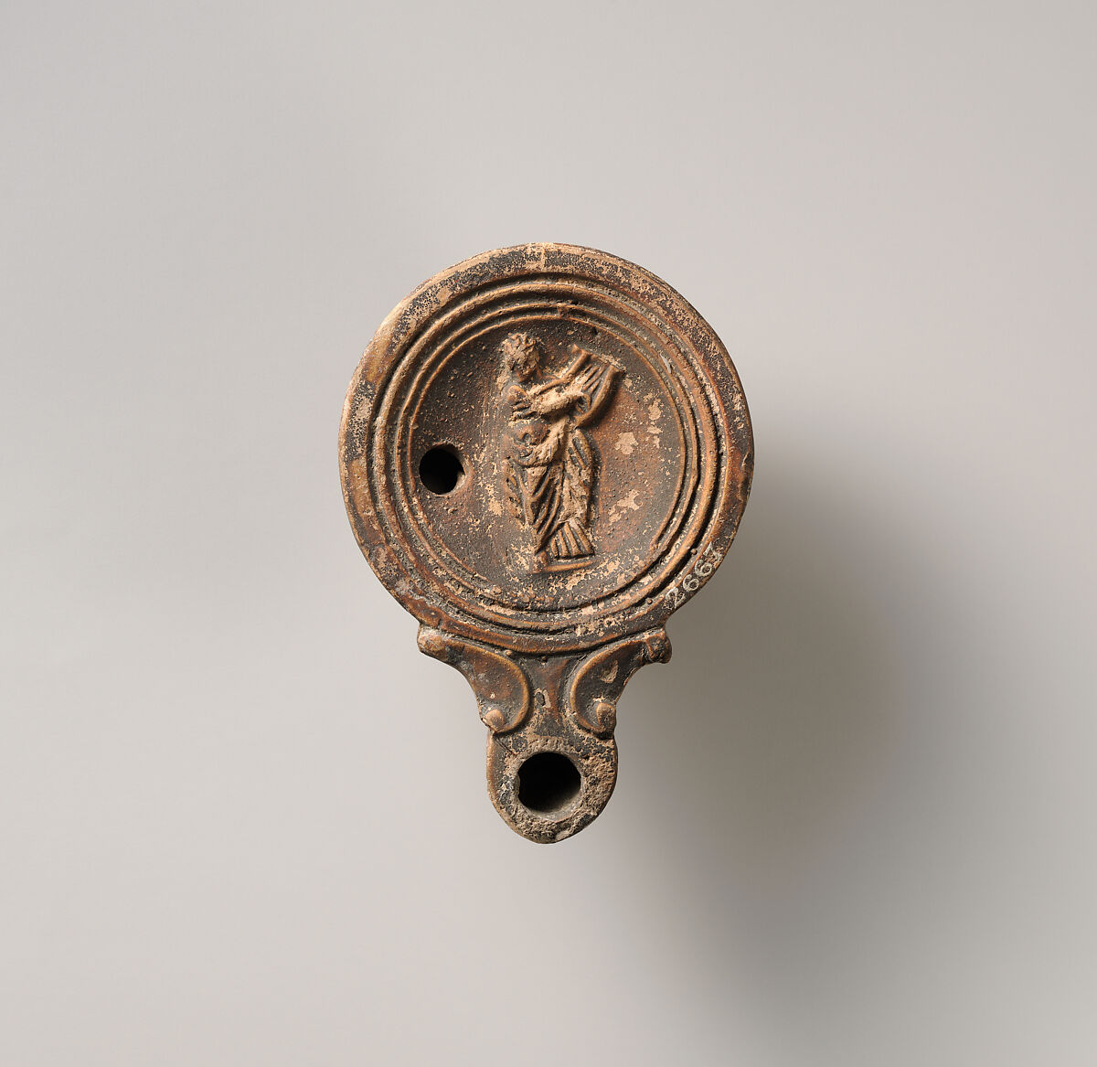 Terracotta oil lamp, Terracotta, Roman 