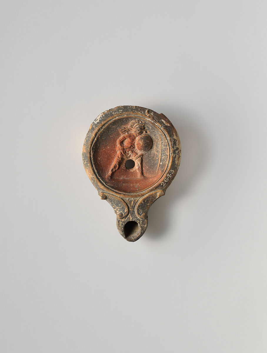 Terracotta oil lamp